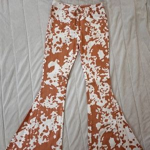 NWT Saints & Hearts Cow Print High Rise Bell Bottom Jeans in Rust